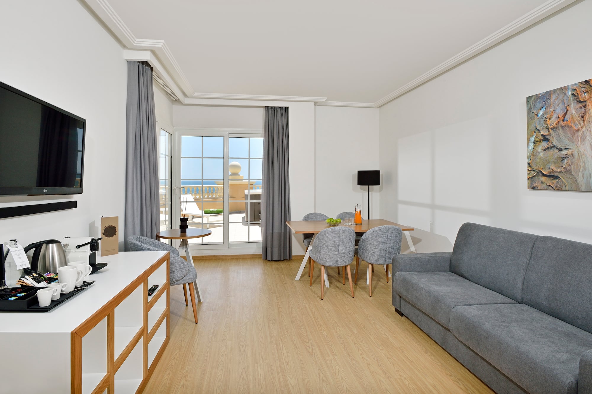 a living room with a couch and table