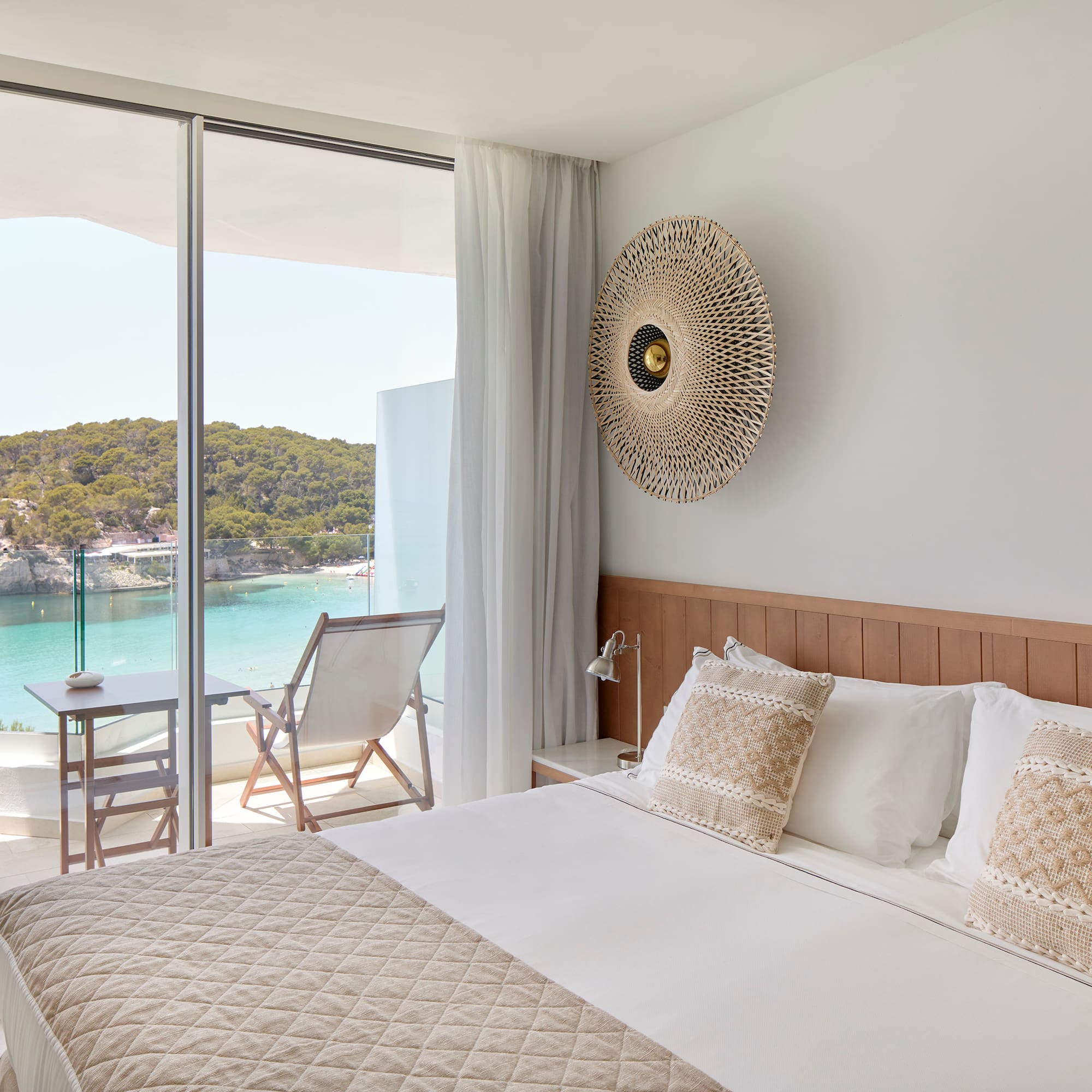 a bed with a view of the ocean