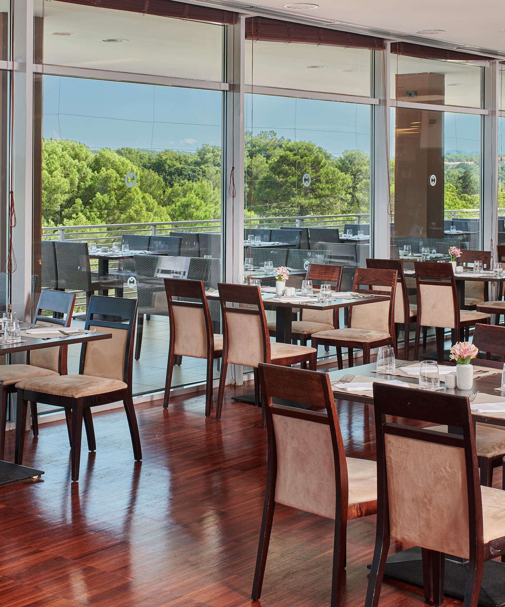 a restaurant with tables and chairs