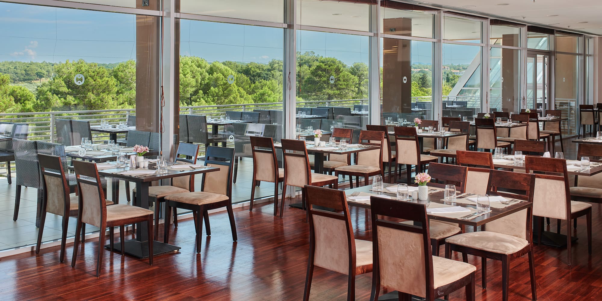 a restaurant with tables and chairs