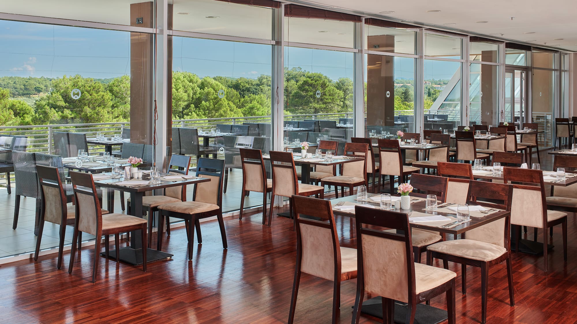 a restaurant with tables and chairs