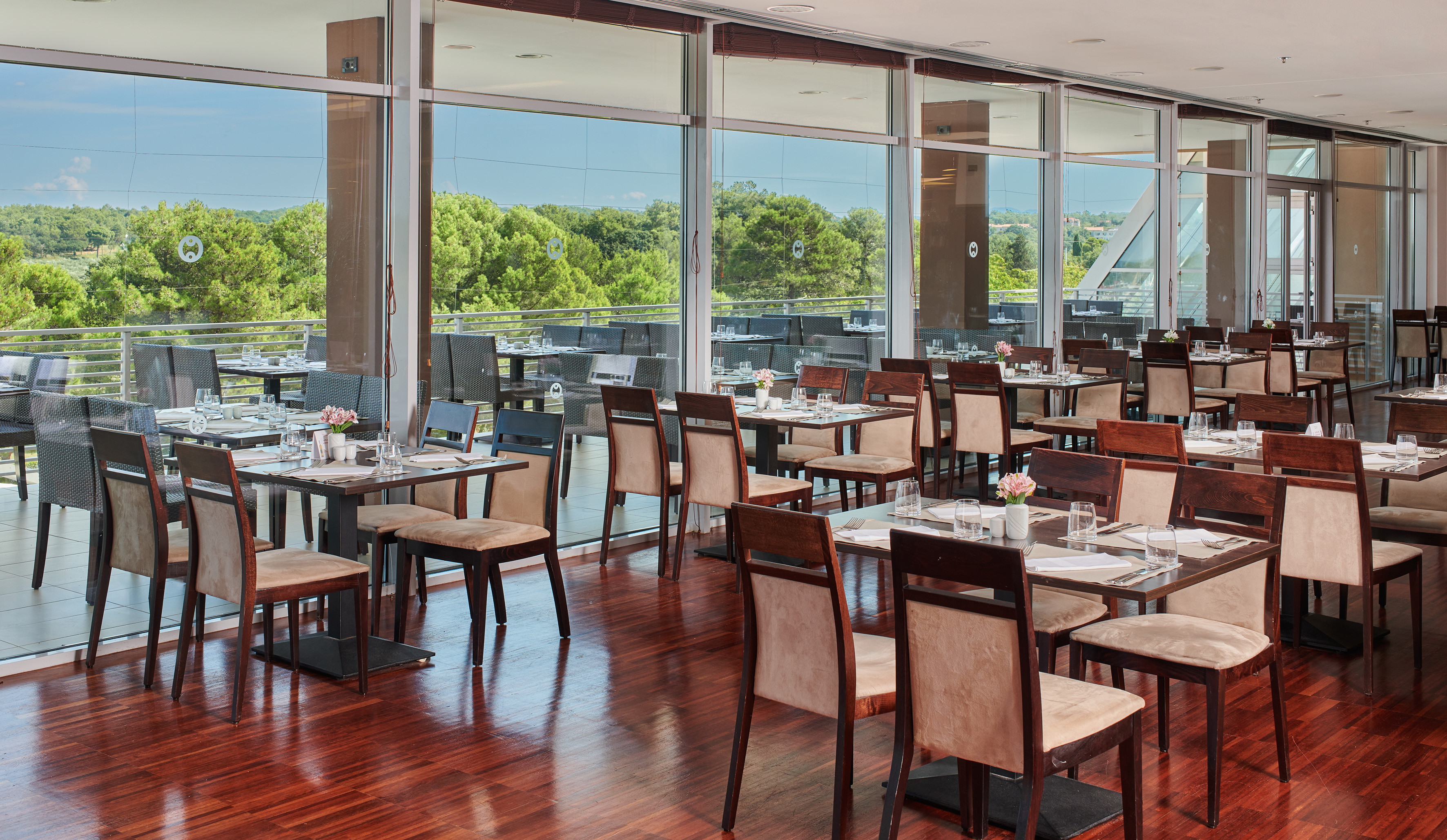 a restaurant with tables and chairs