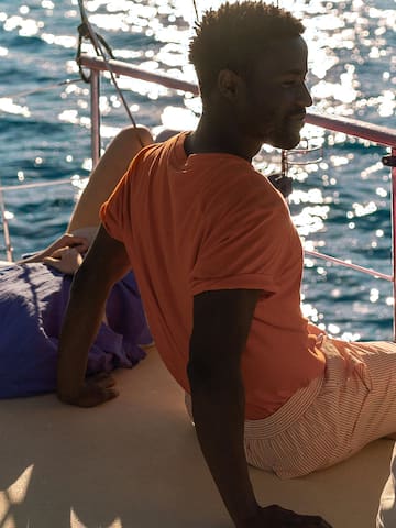 a man sitting on a boat