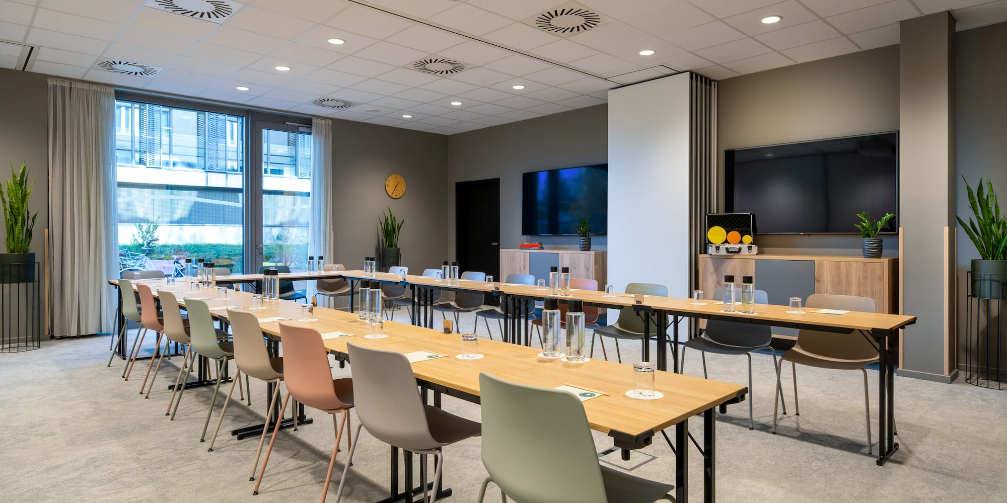 a room with tables and chairs