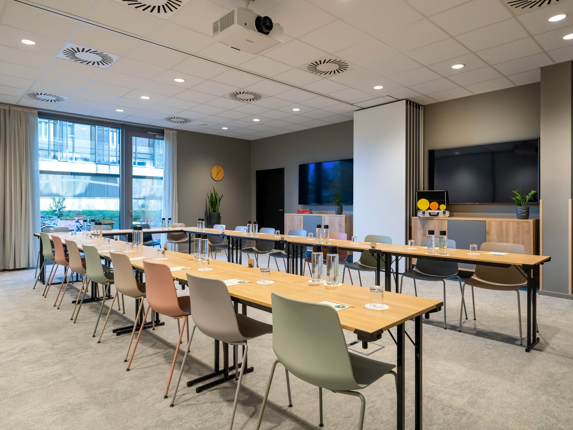 a room with tables and chairs