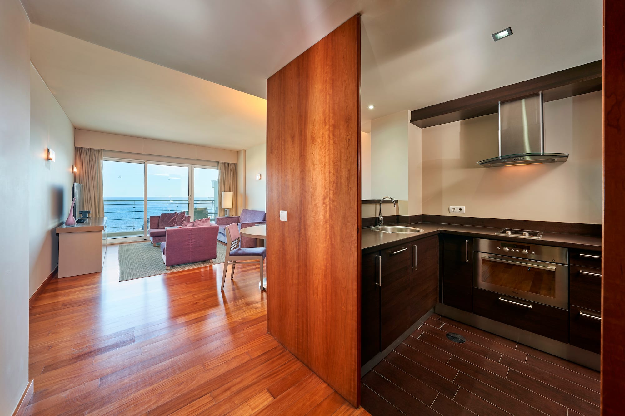 a room with a wood floor and a wood floor and a wood floor