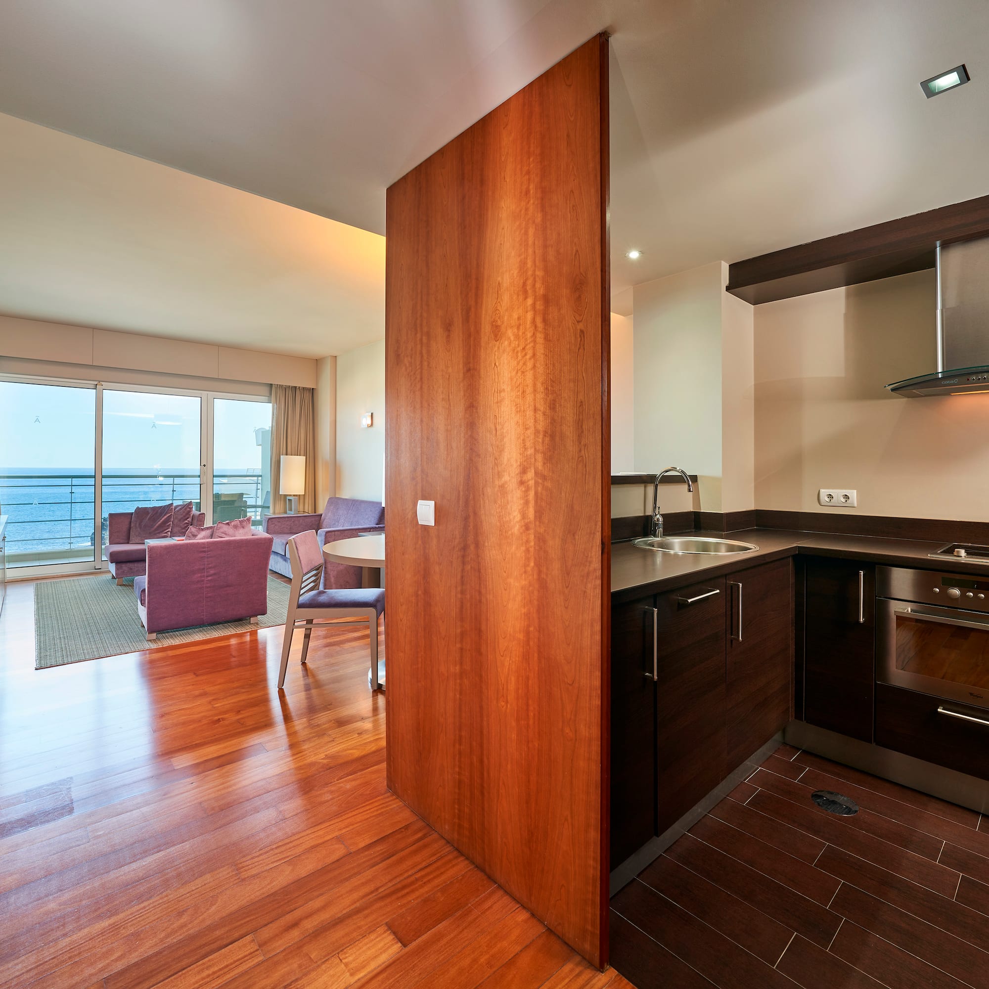 a room with a wood floor and a wood floor and a wood floor