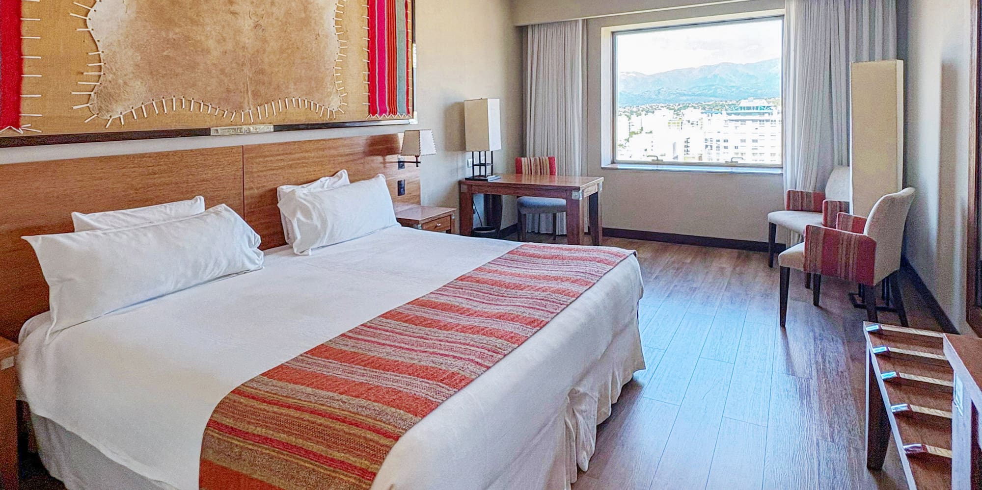 a room with a bed and a table