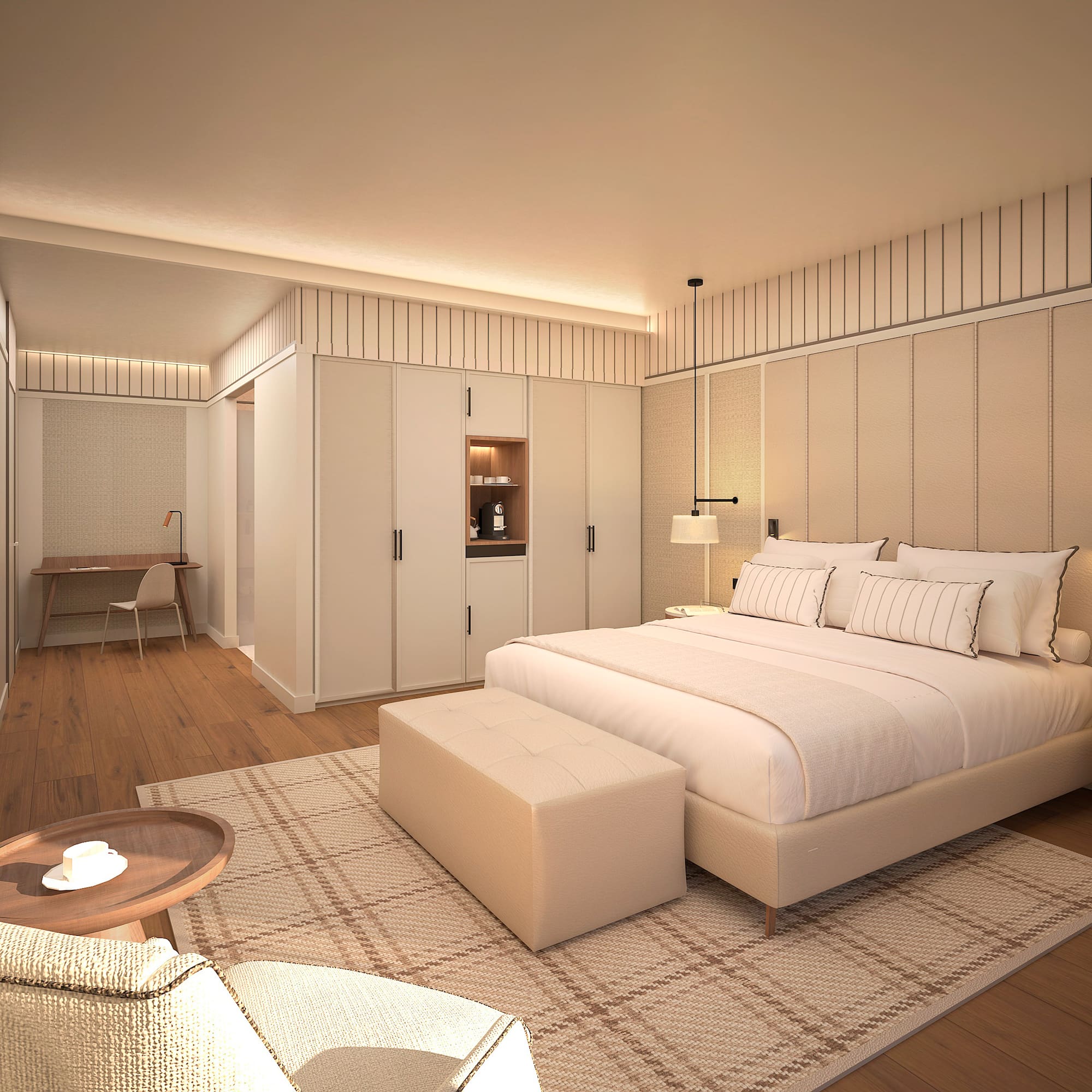 Modernes Hotelzimmer mit großem Doppelbett, Sitzecke und hellem Holzboden. - Deluxe Room mit Solarium - Hotel Golf Santa Ponsa Meliá Collection, Mallorca
