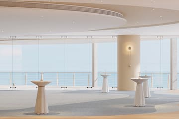 a room with tables and chairs