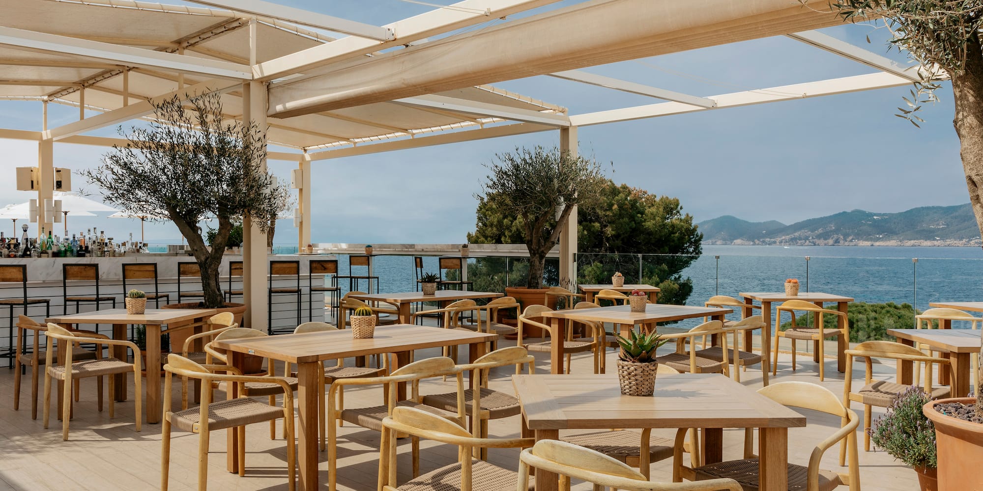 a restaurant with tables and chairs