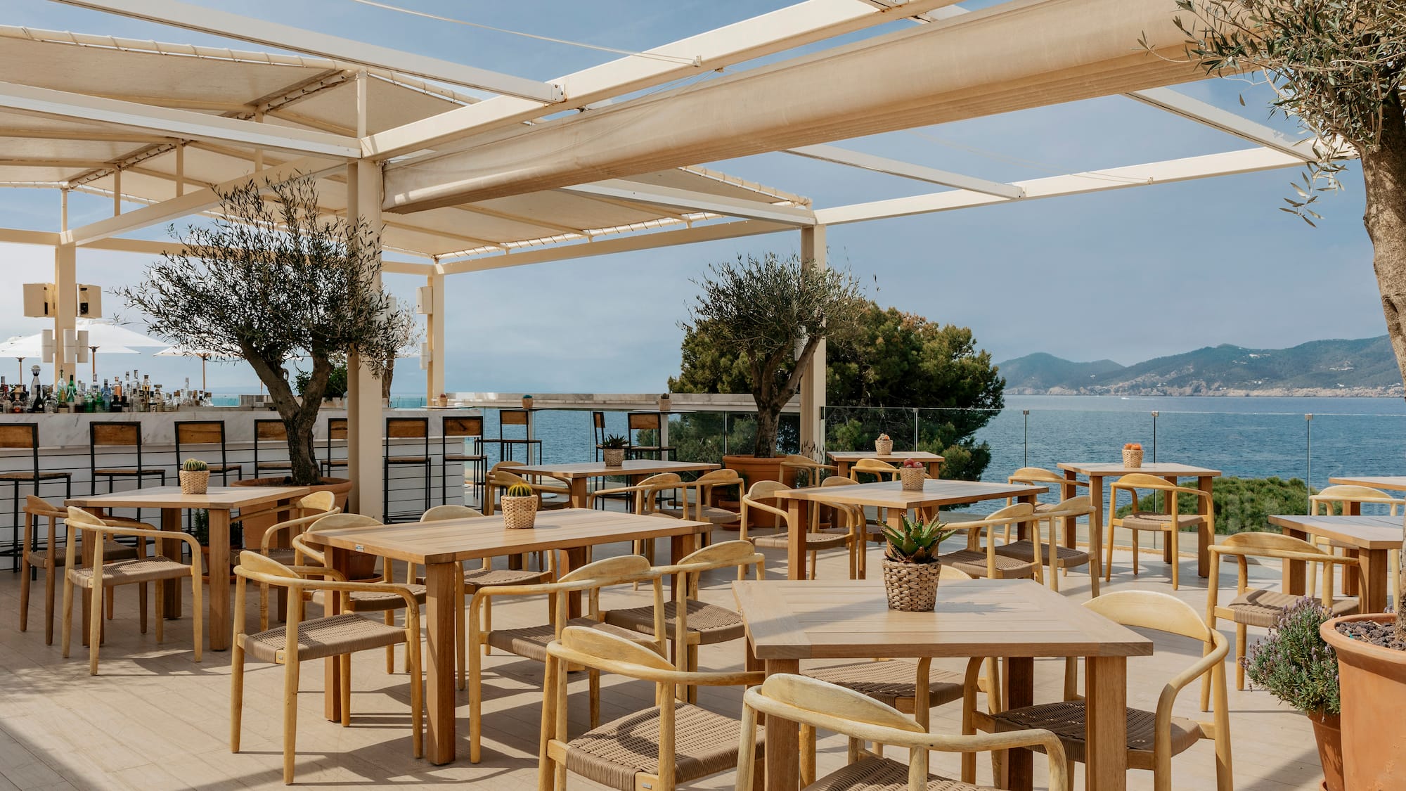 a restaurant with tables and chairs