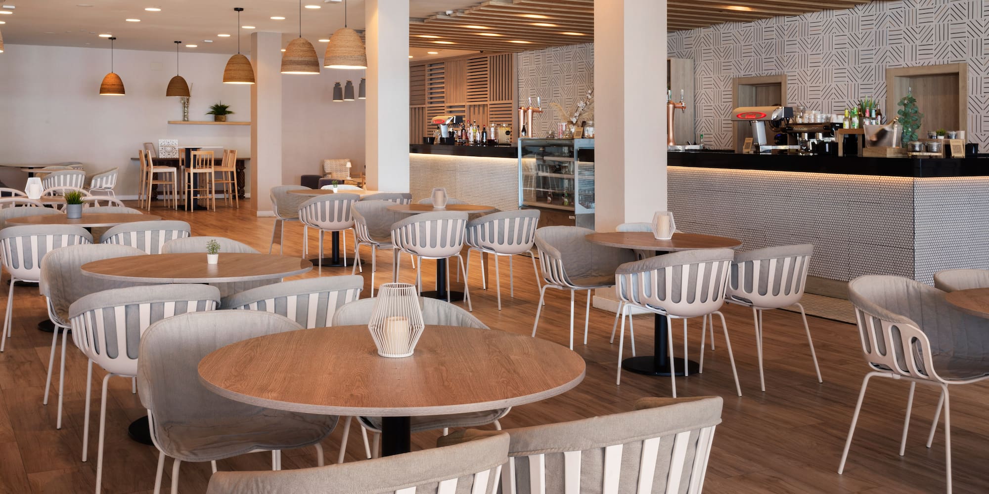 a restaurant with tables and chairs