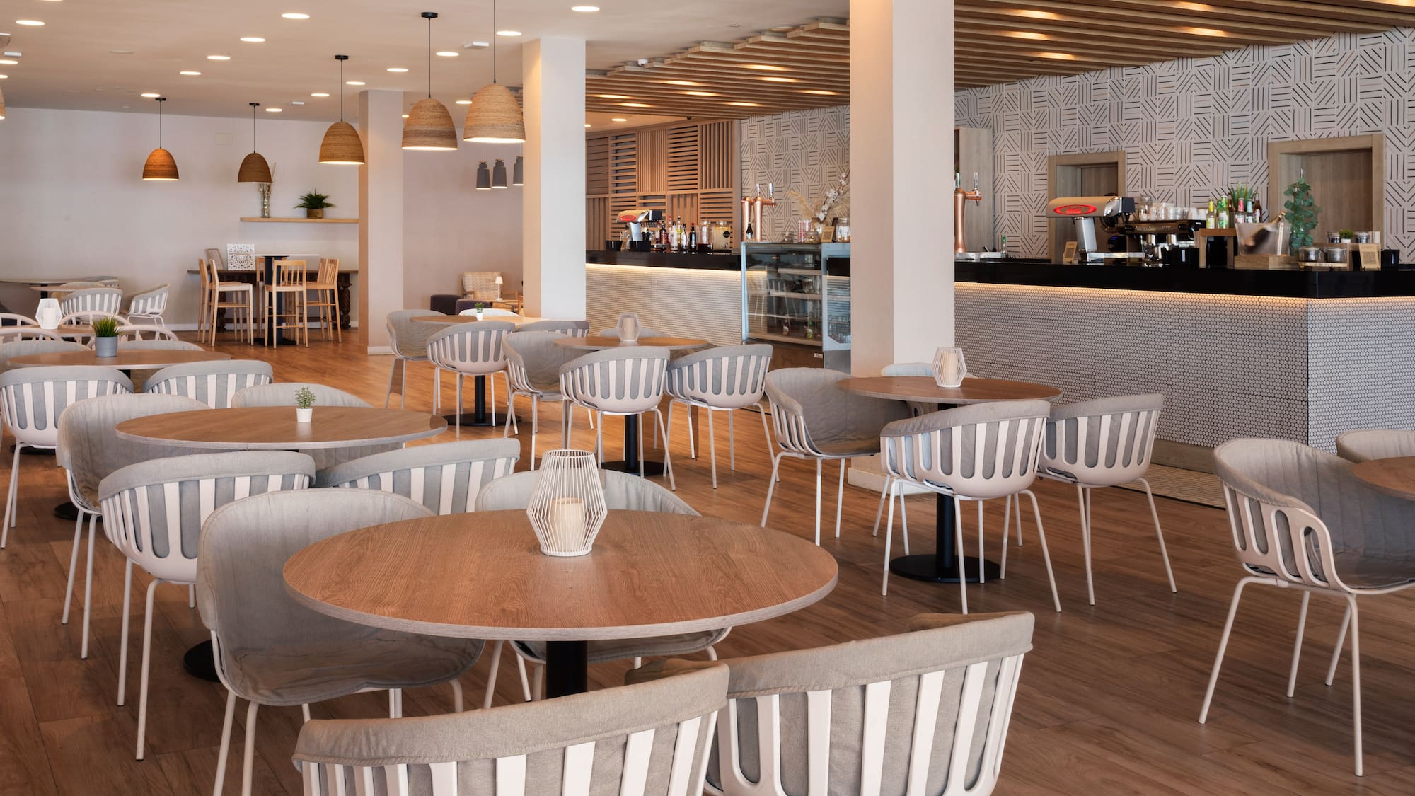 a restaurant with tables and chairs