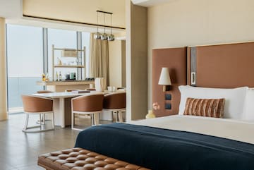 a room with a bed and a table