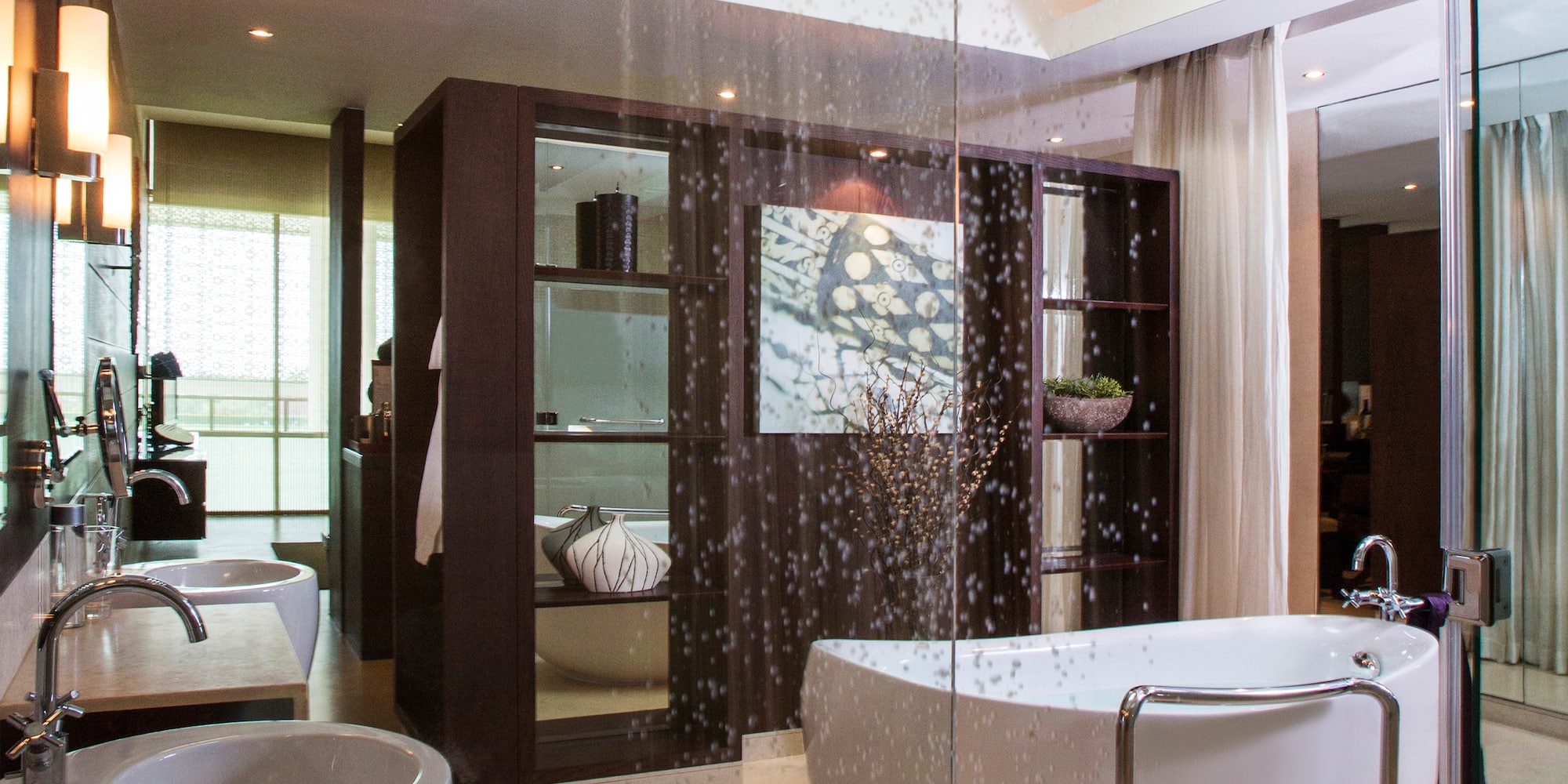 a bathroom with a glass shower
