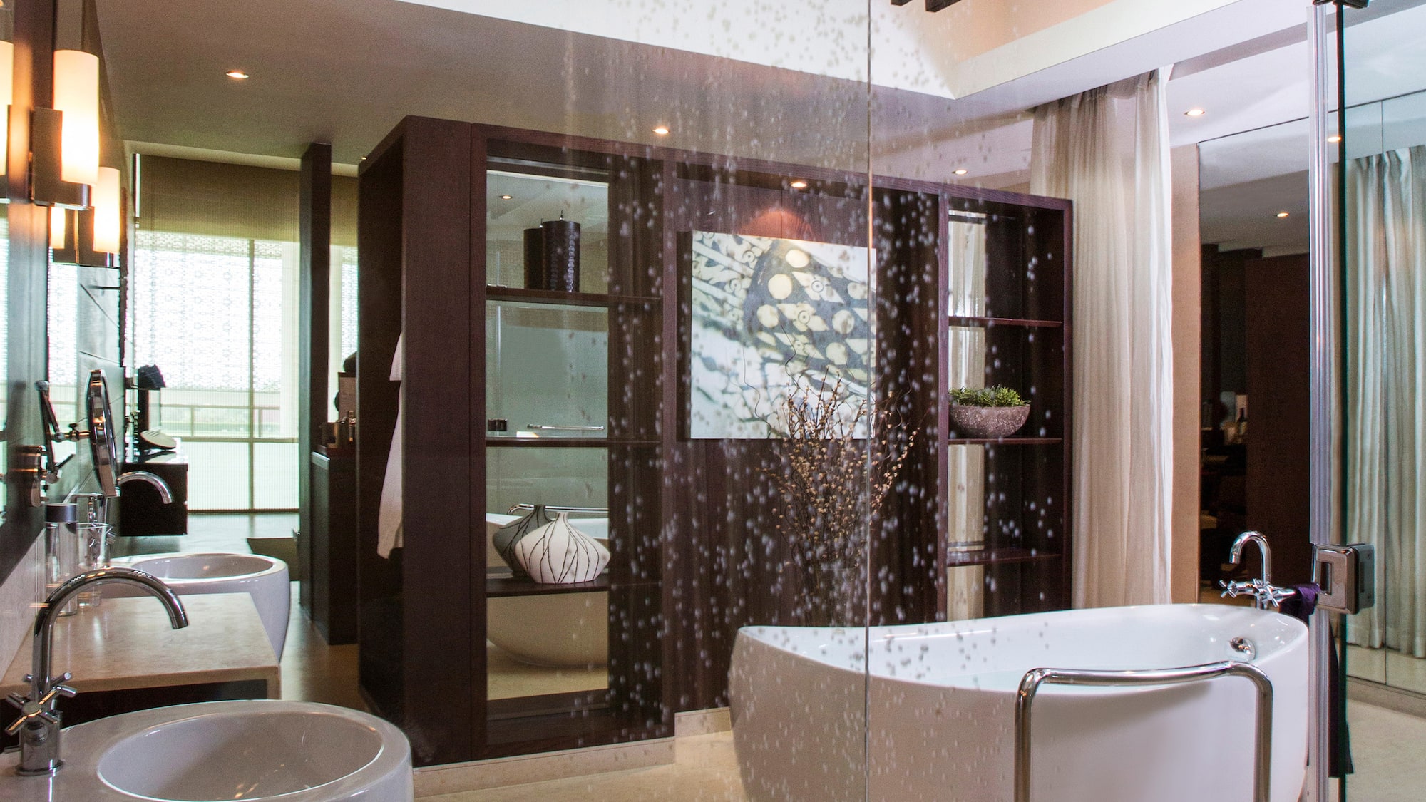 a bathroom with a glass shower