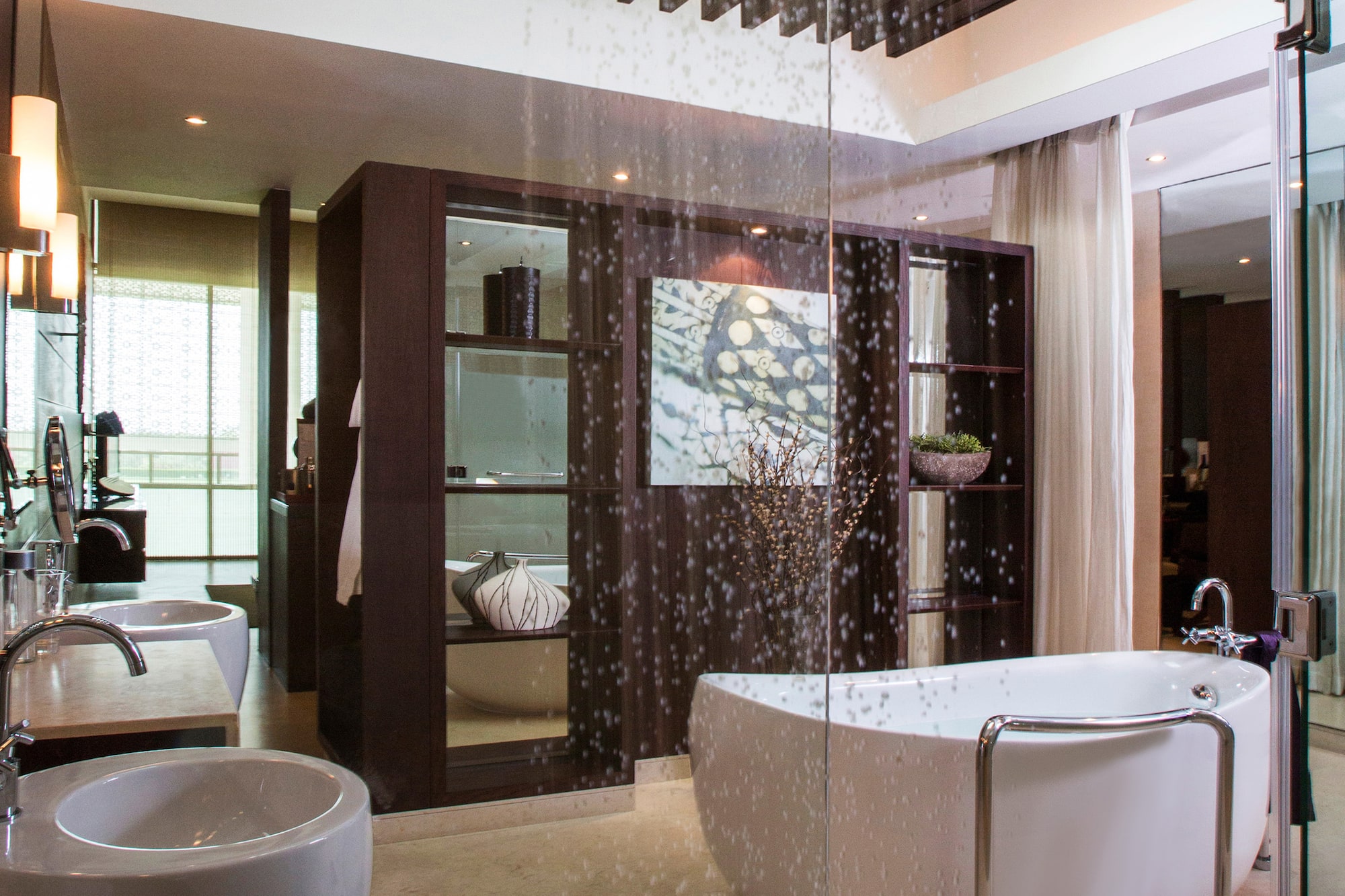 a bathroom with a glass shower