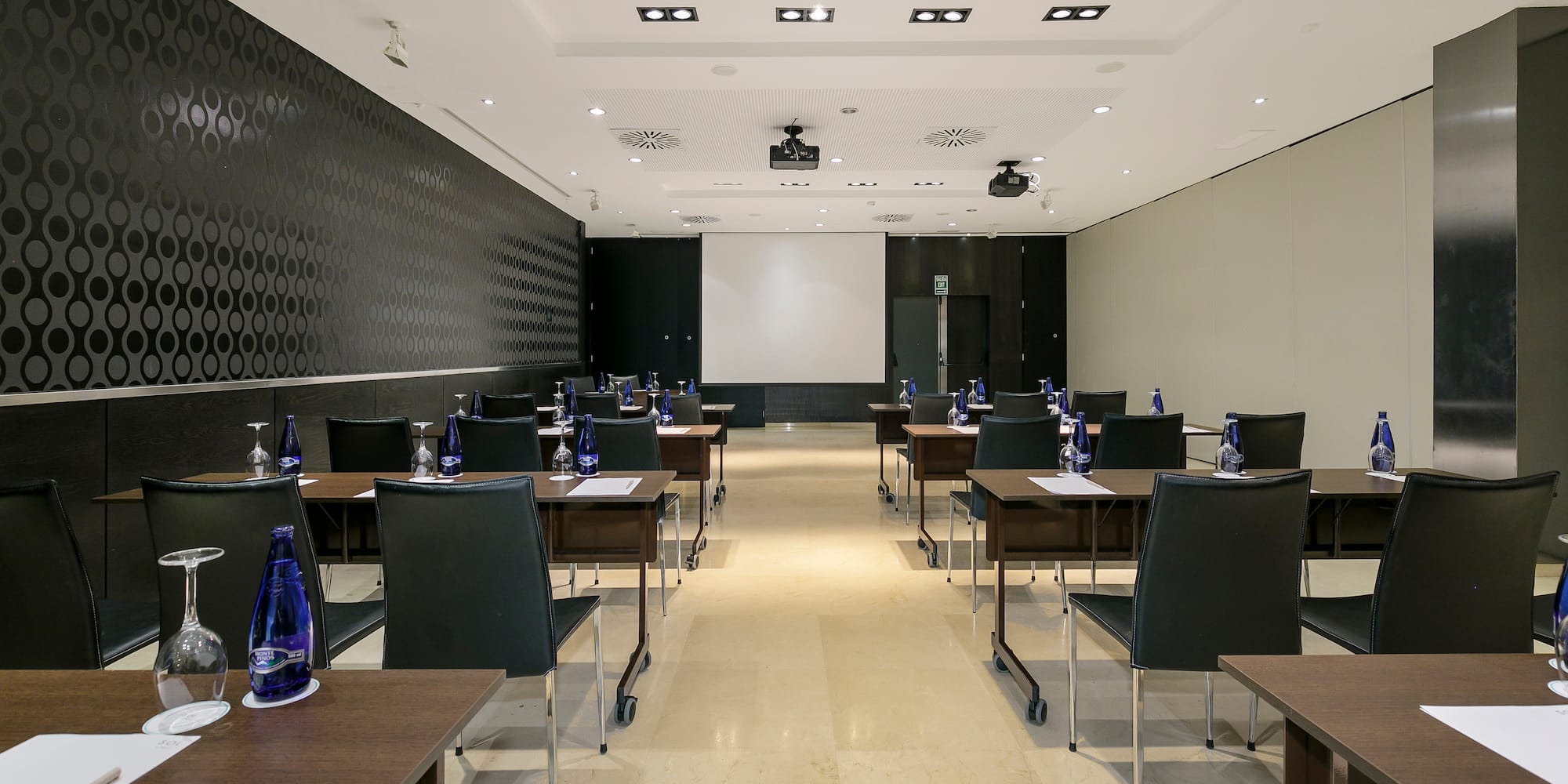 a room with tables and chairs