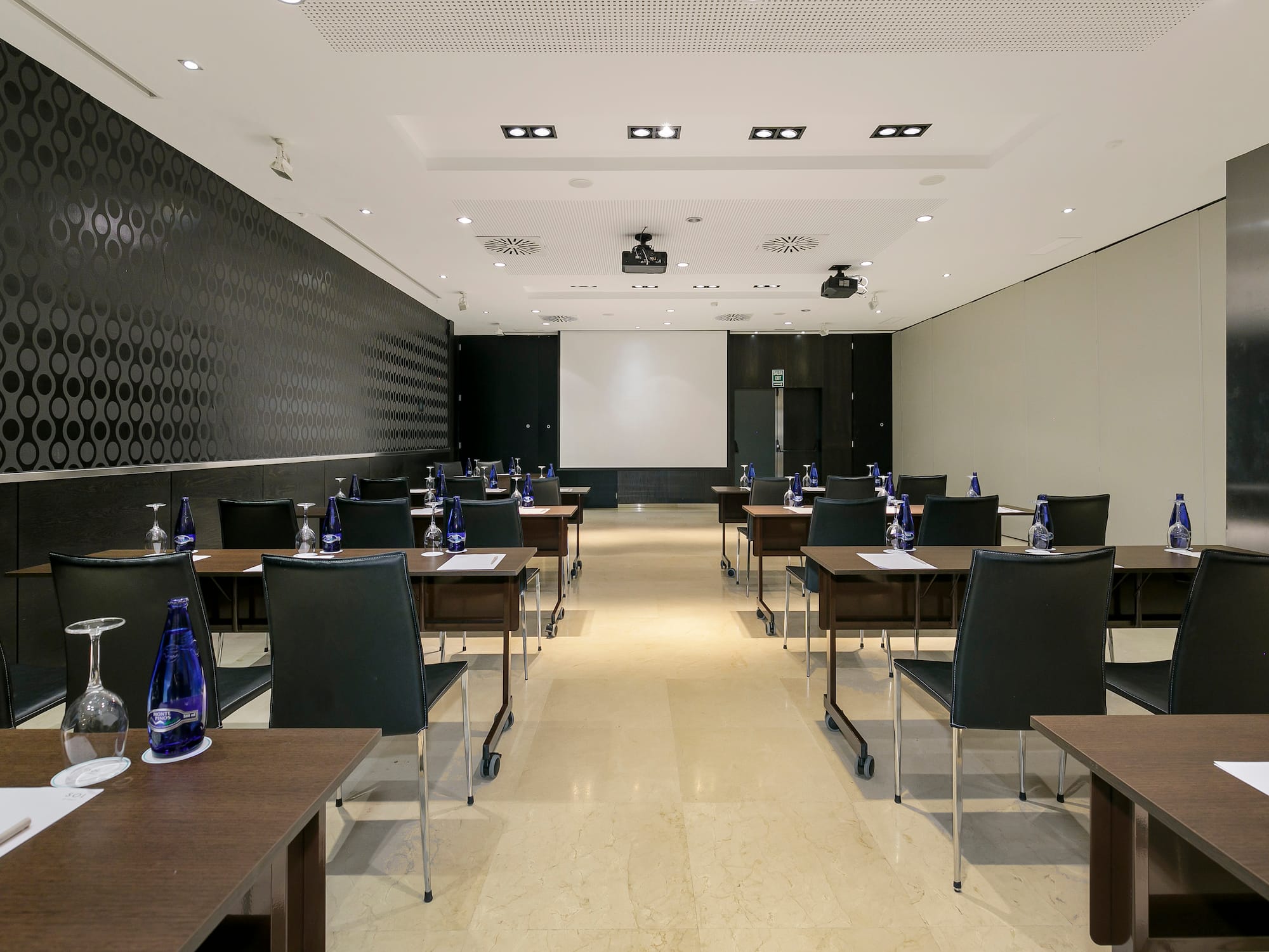 a room with tables and chairs