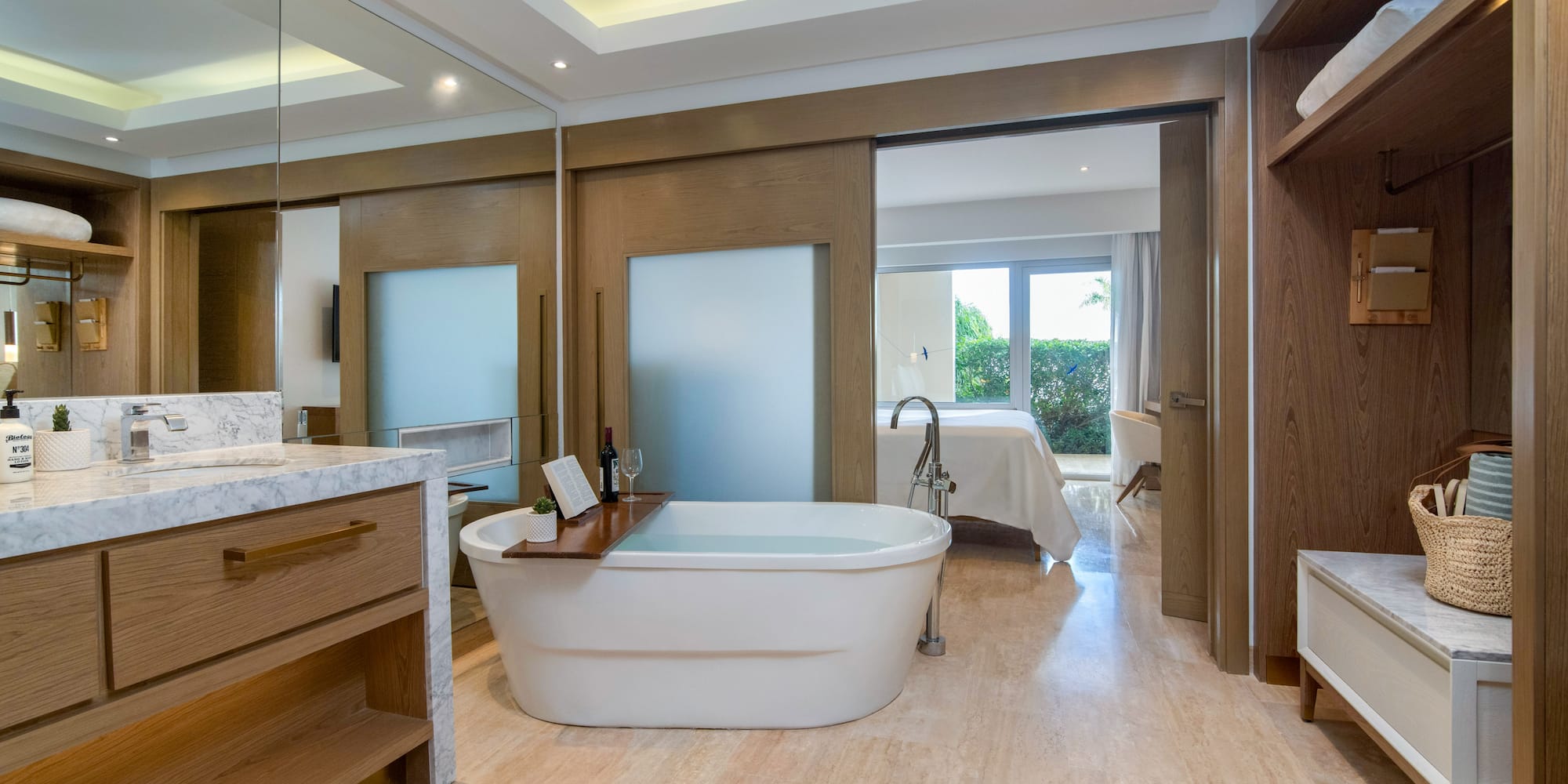 a bathroom with a tub and a mirror