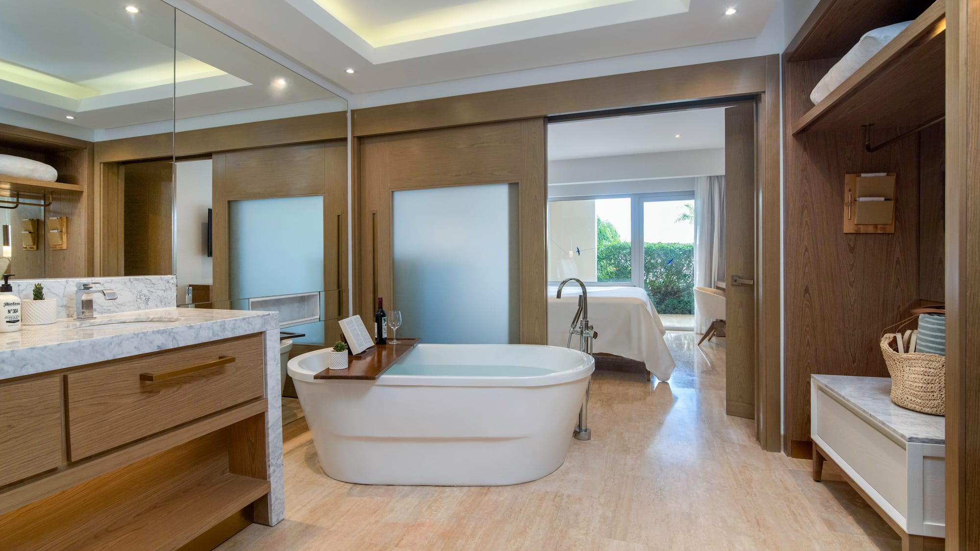 a bathroom with a tub and a mirror