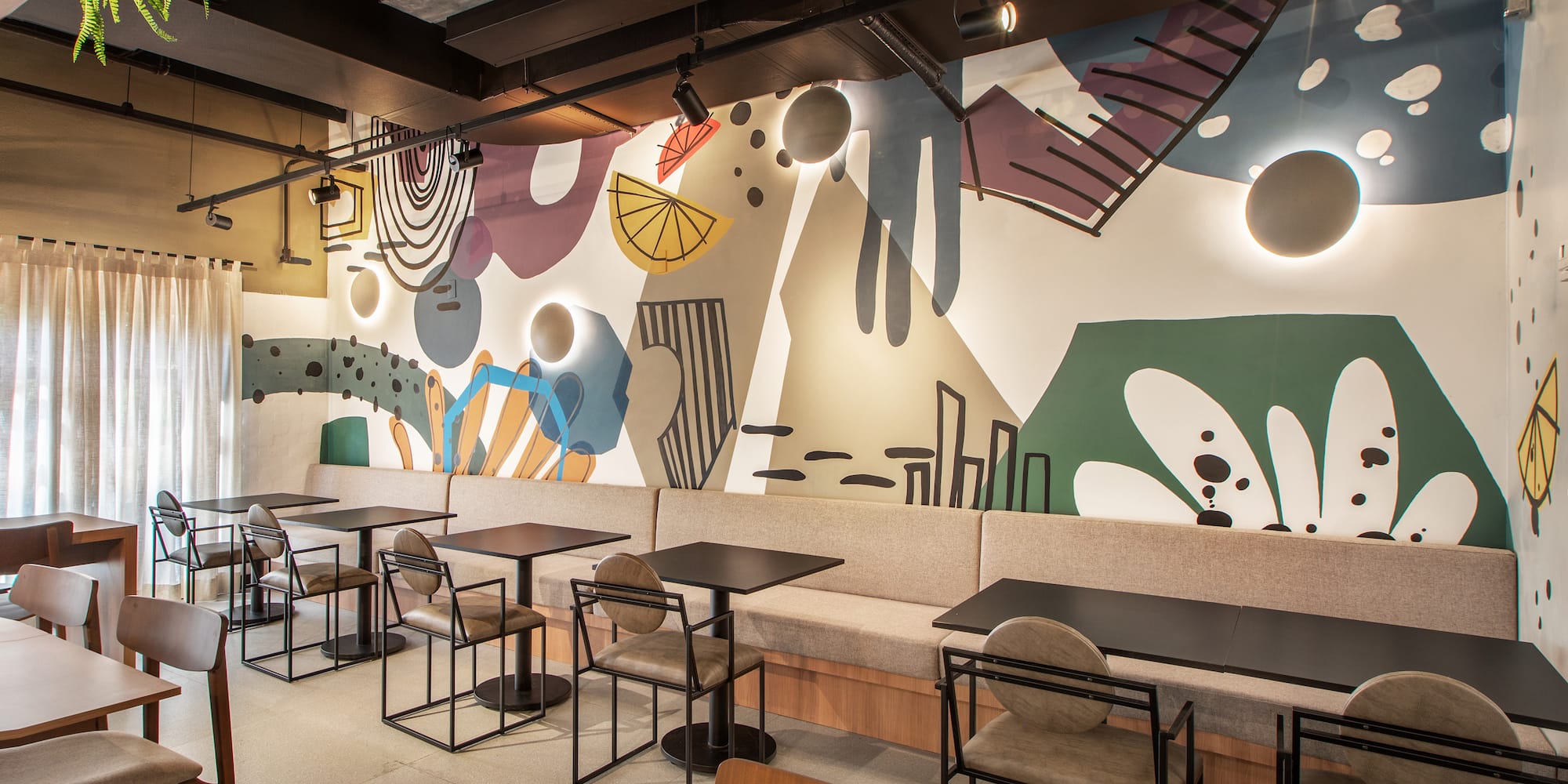 a room with tables and chairs