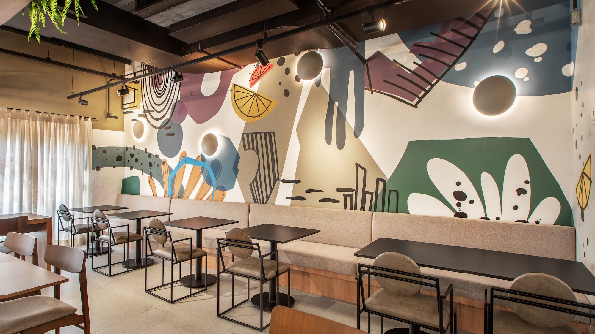 a room with tables and chairs