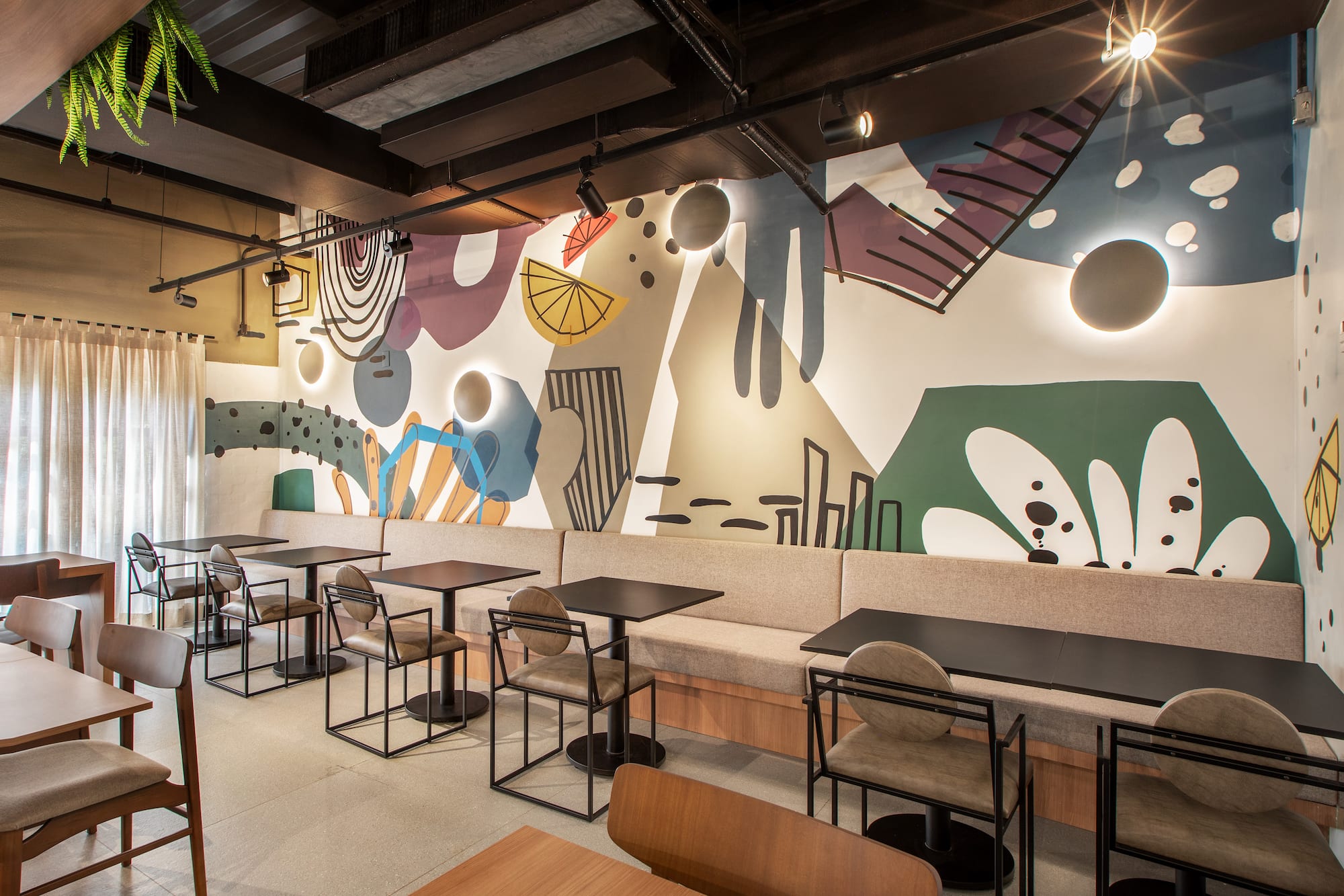 a room with tables and chairs