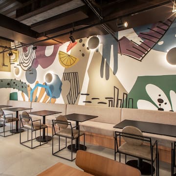 a room with tables and chairs