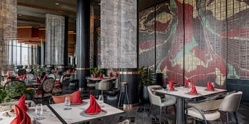 a restaurant with tables and chairs