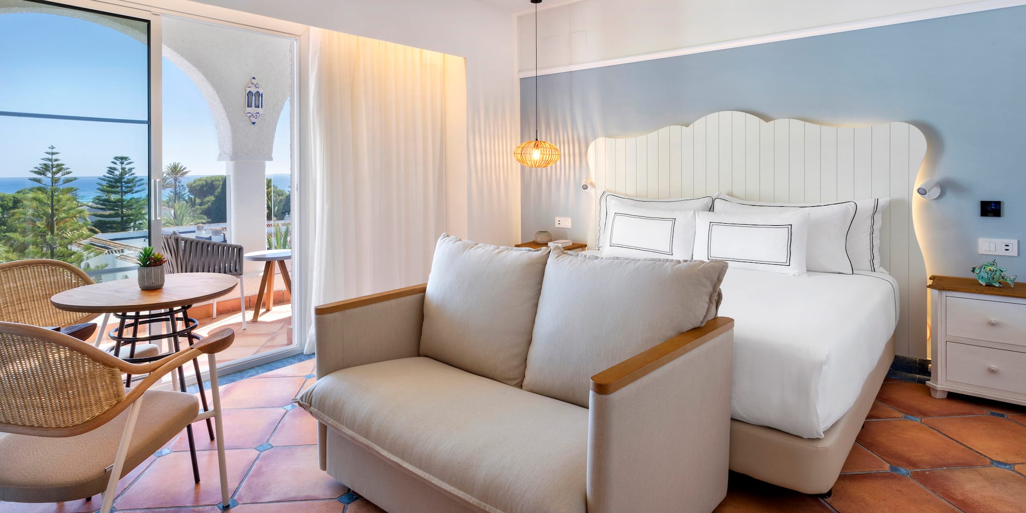 a room with a bed and a couch