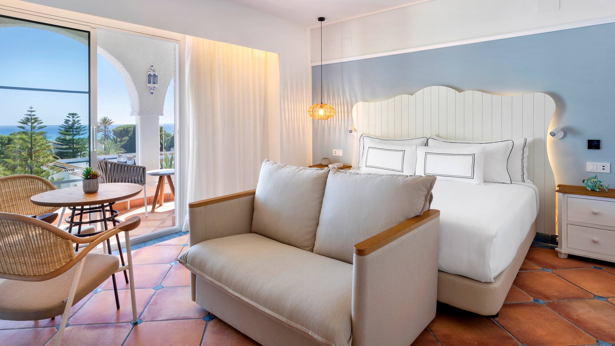 a room with a bed and a couch