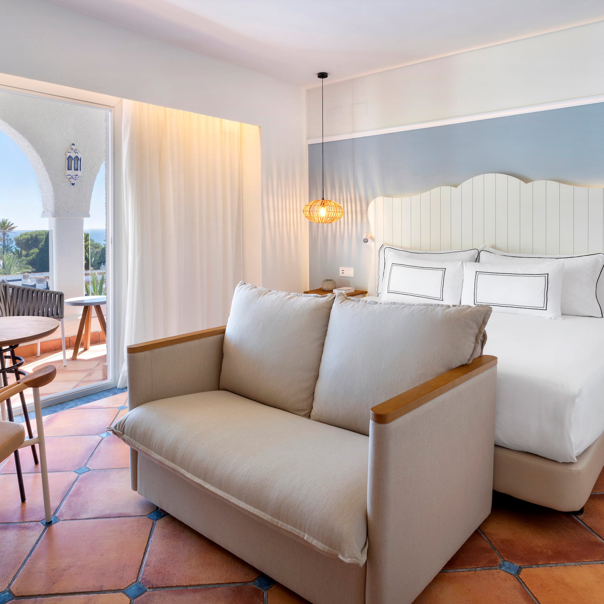 a room with a bed and a couch