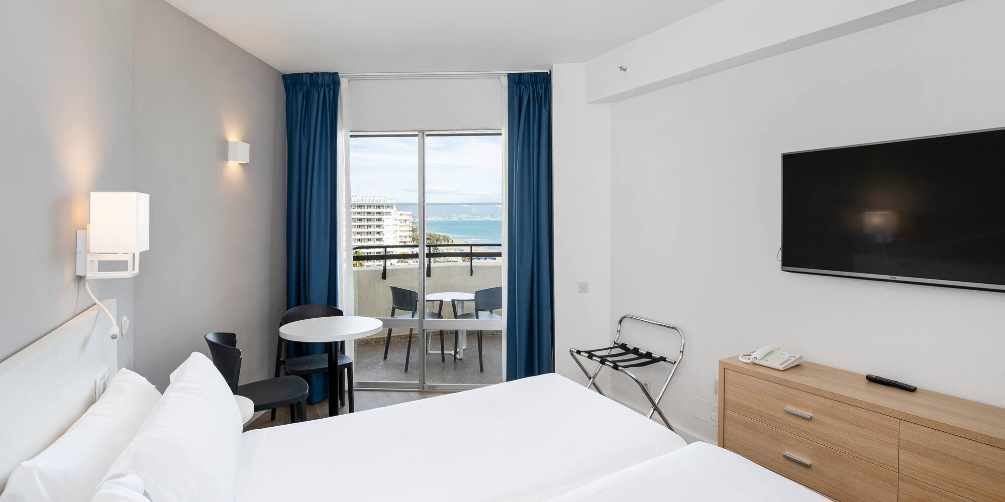 a room with a television and a table