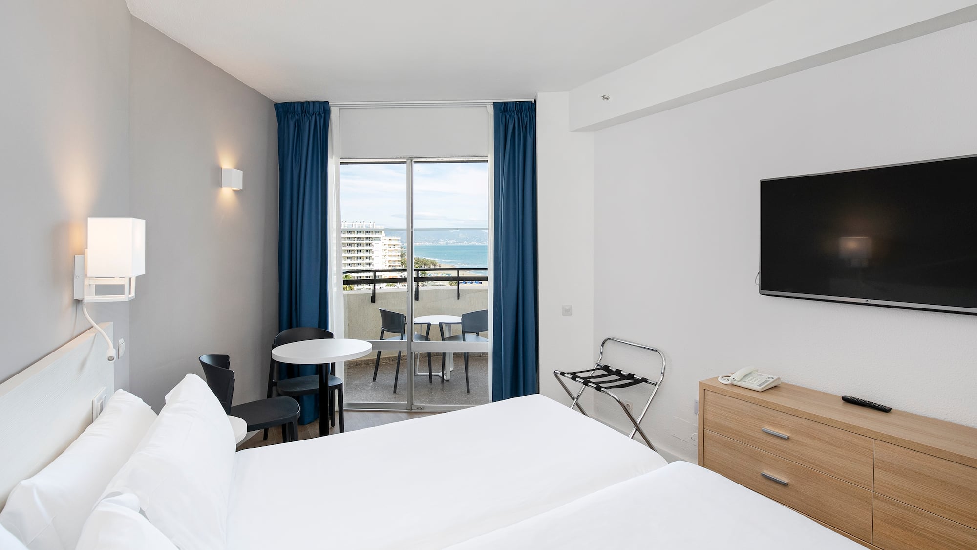 a room with a television and a table