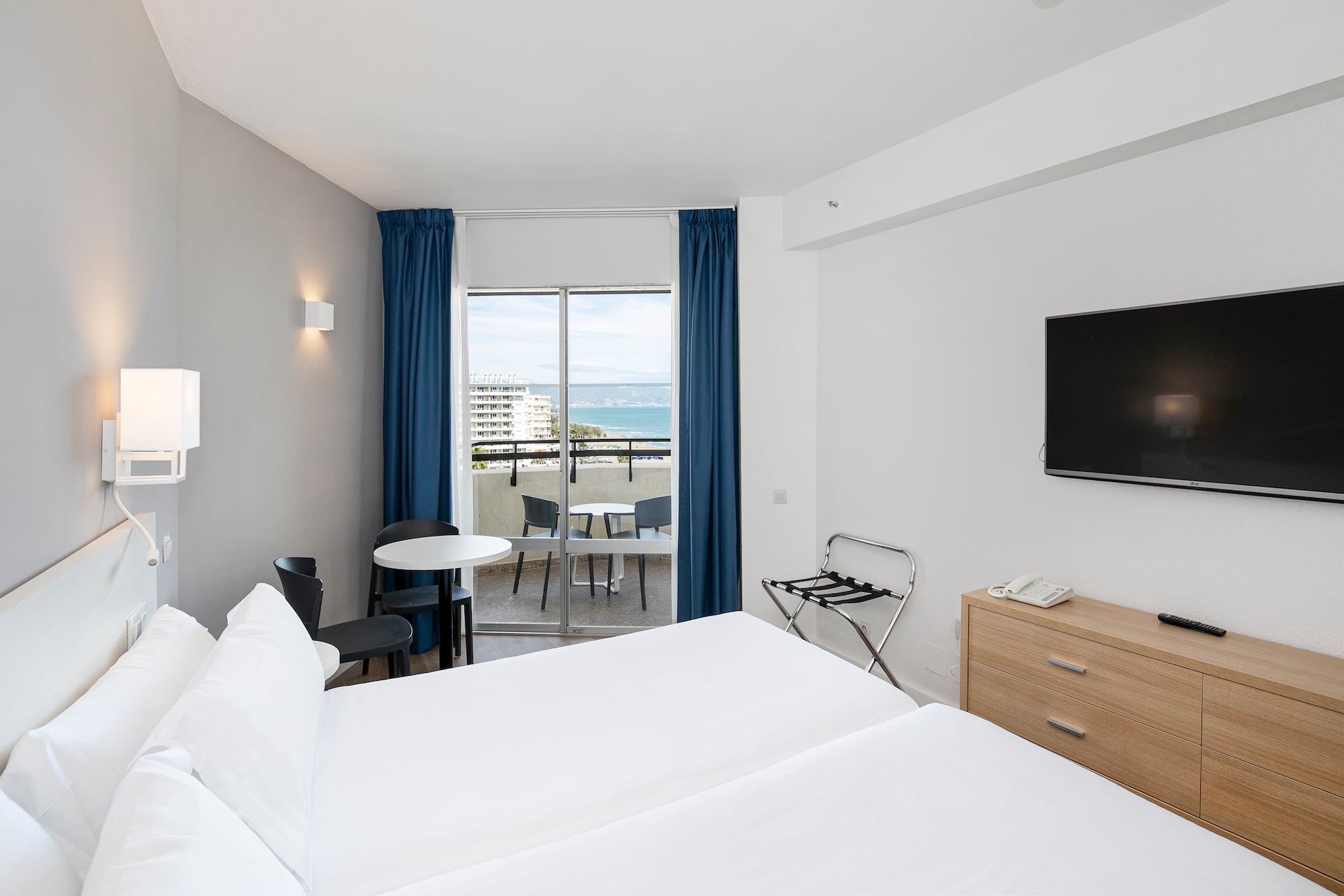 a room with a television and a table