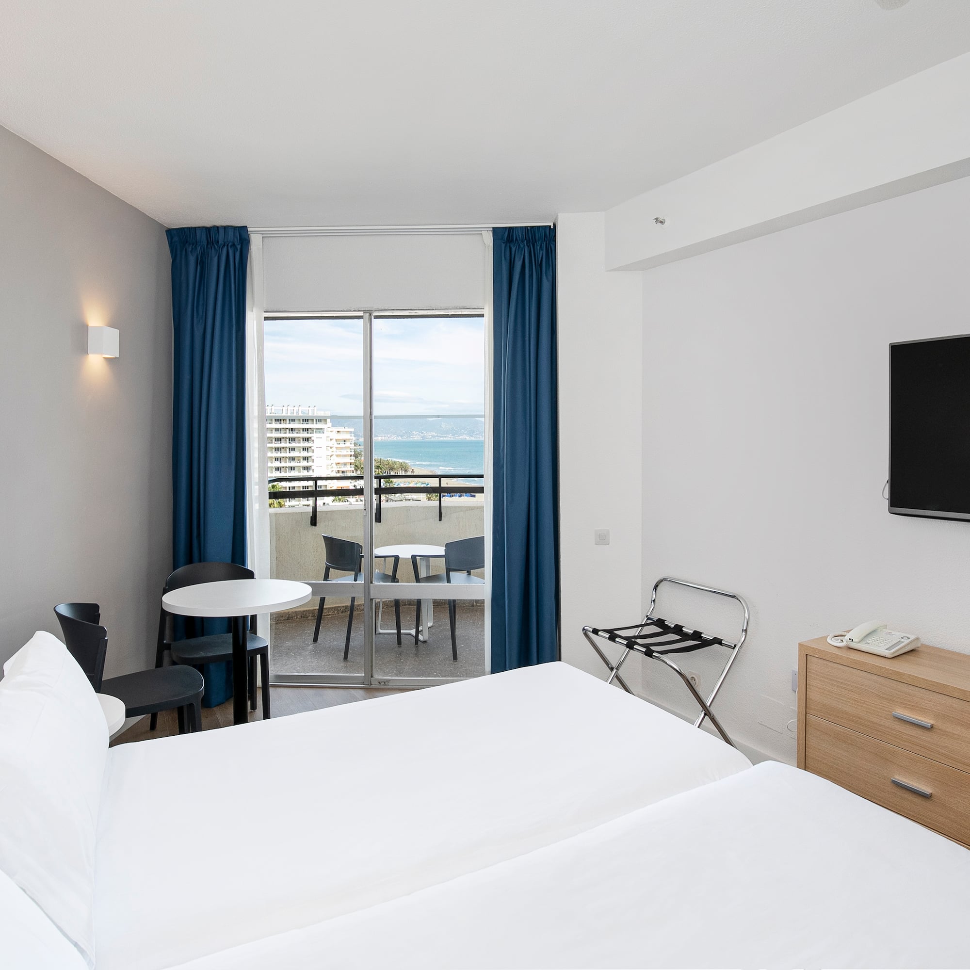 a room with a television and a table