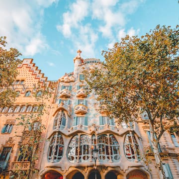 a building with trees in the background