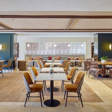 a room with tables and chairs