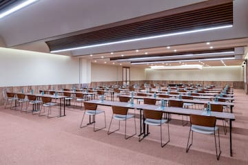 a room with tables and chairs