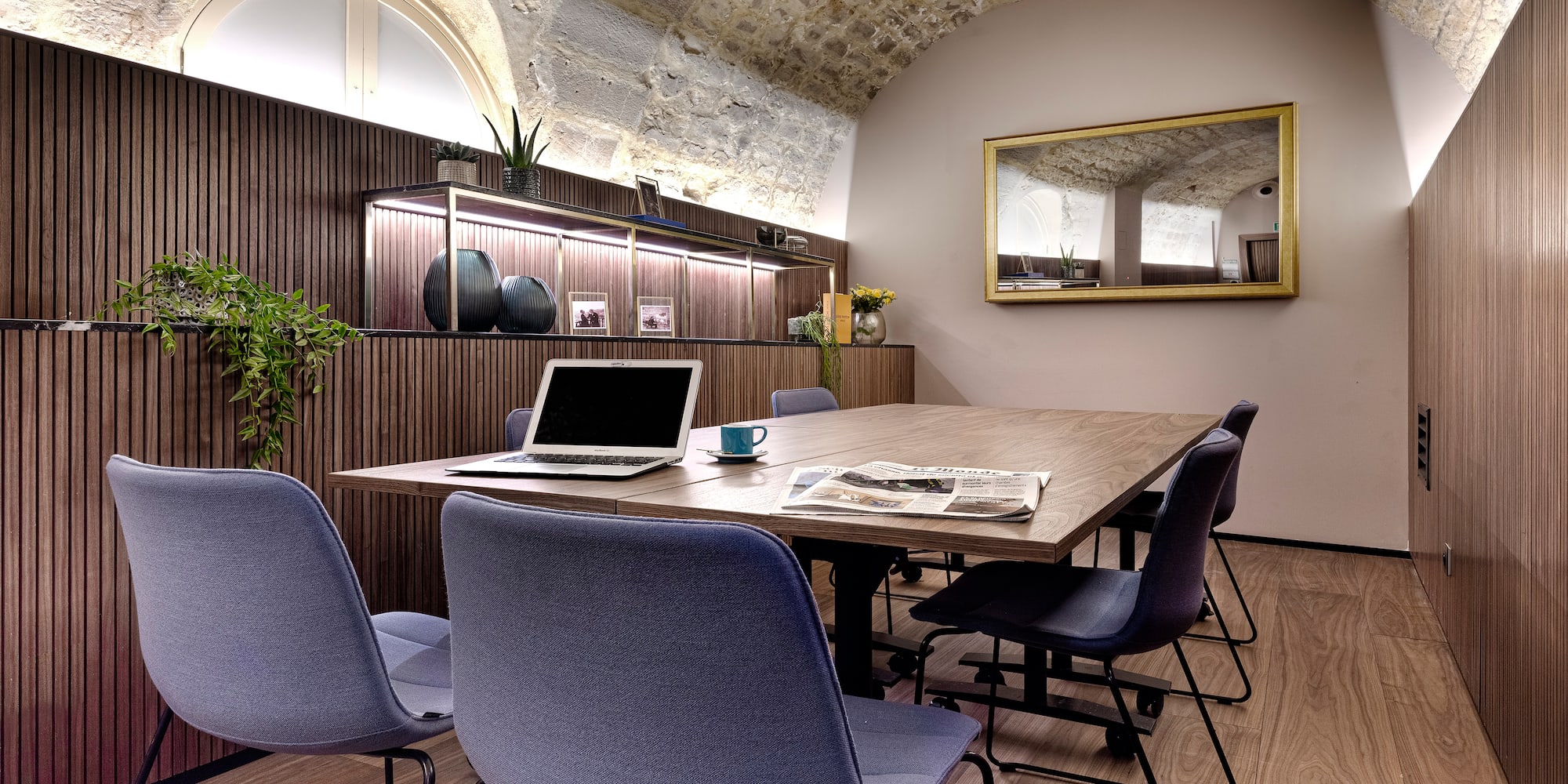 a room with a table and chairs