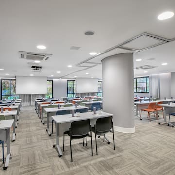 a room with tables and chairs