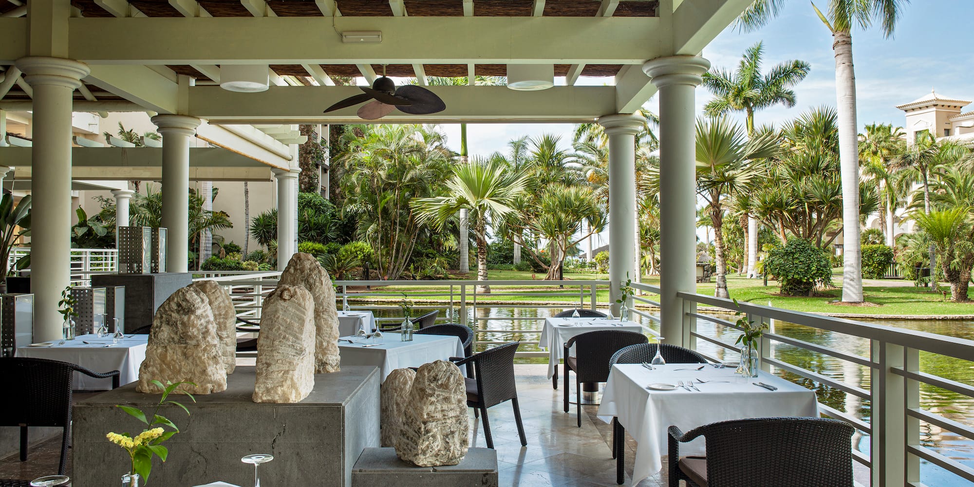 a restaurant with tables and chairs