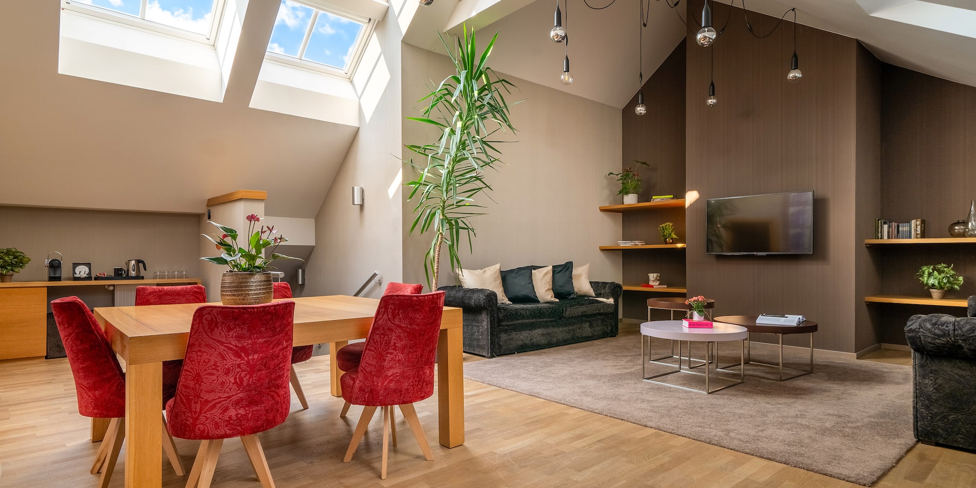 a room with a table and chairs