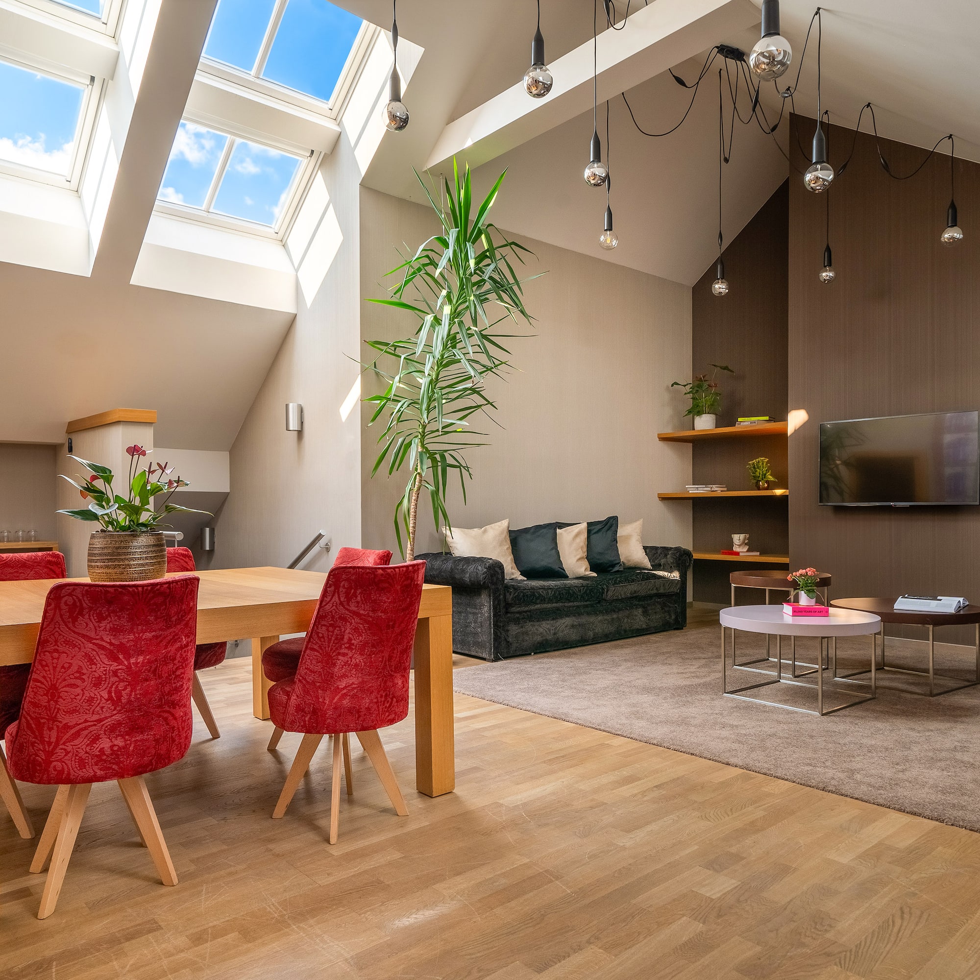 a room with a table and chairs