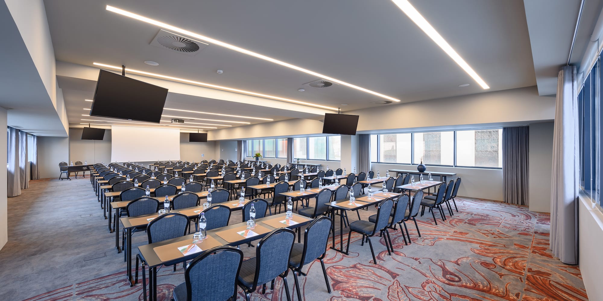 a room with tables and chairs