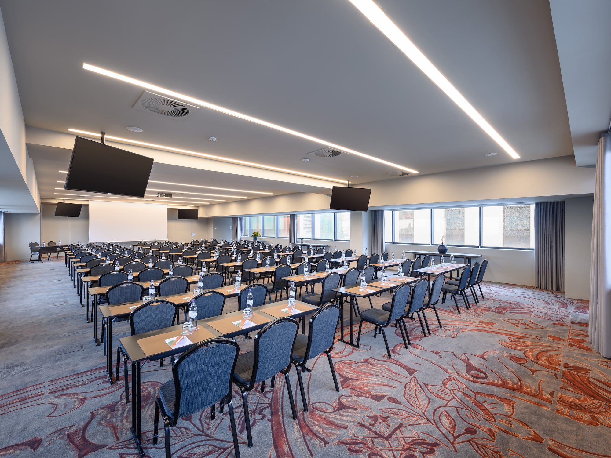 a room with tables and chairs