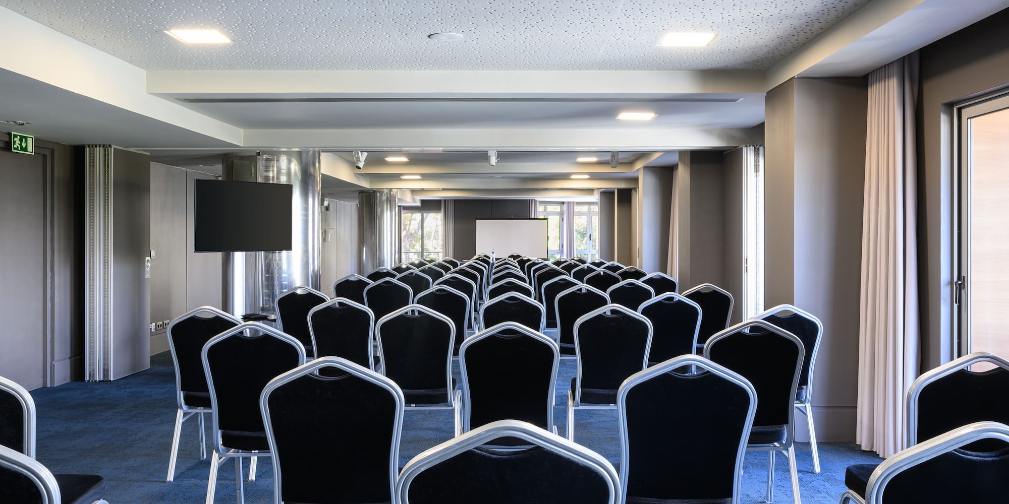 a room with rows of chairs
