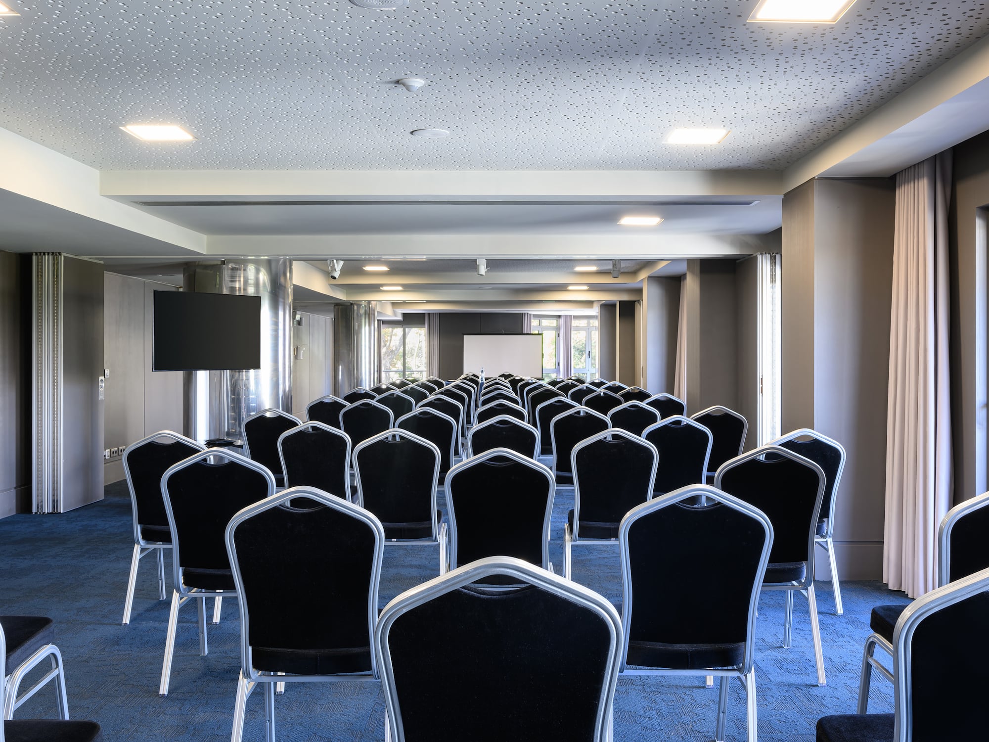 a room with rows of chairs